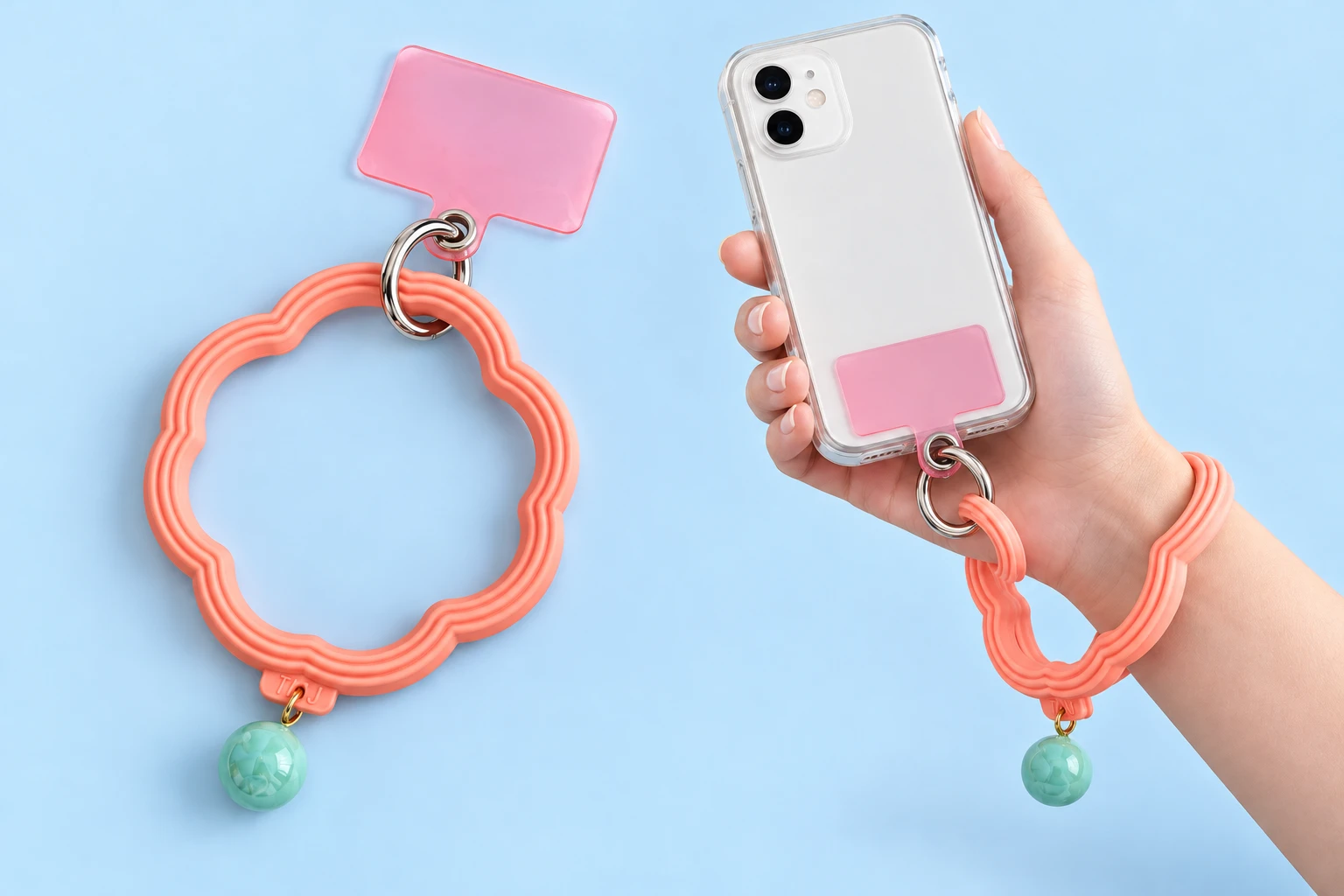 Coral pink scalloped flower wrist lanyard with mint charm and included pink case tab shown complete and worn on a wrist