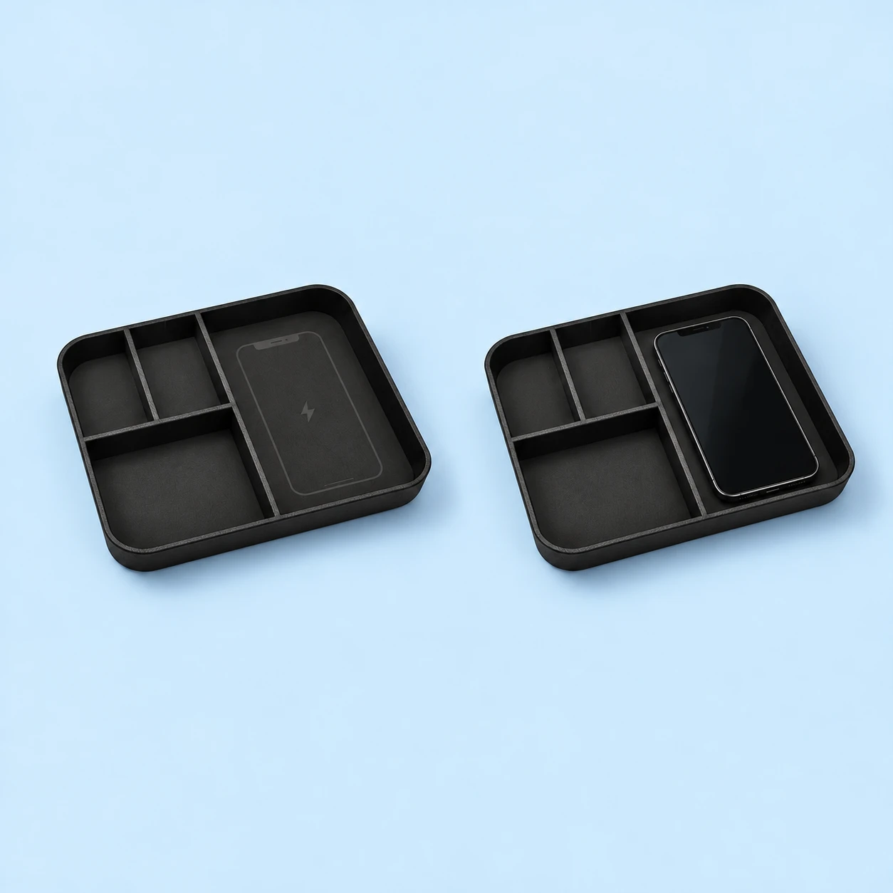 Black Four-Compartment Phone Charging Tray; product and illustrative use on pale blue. Phone and scene props excluded., square composition