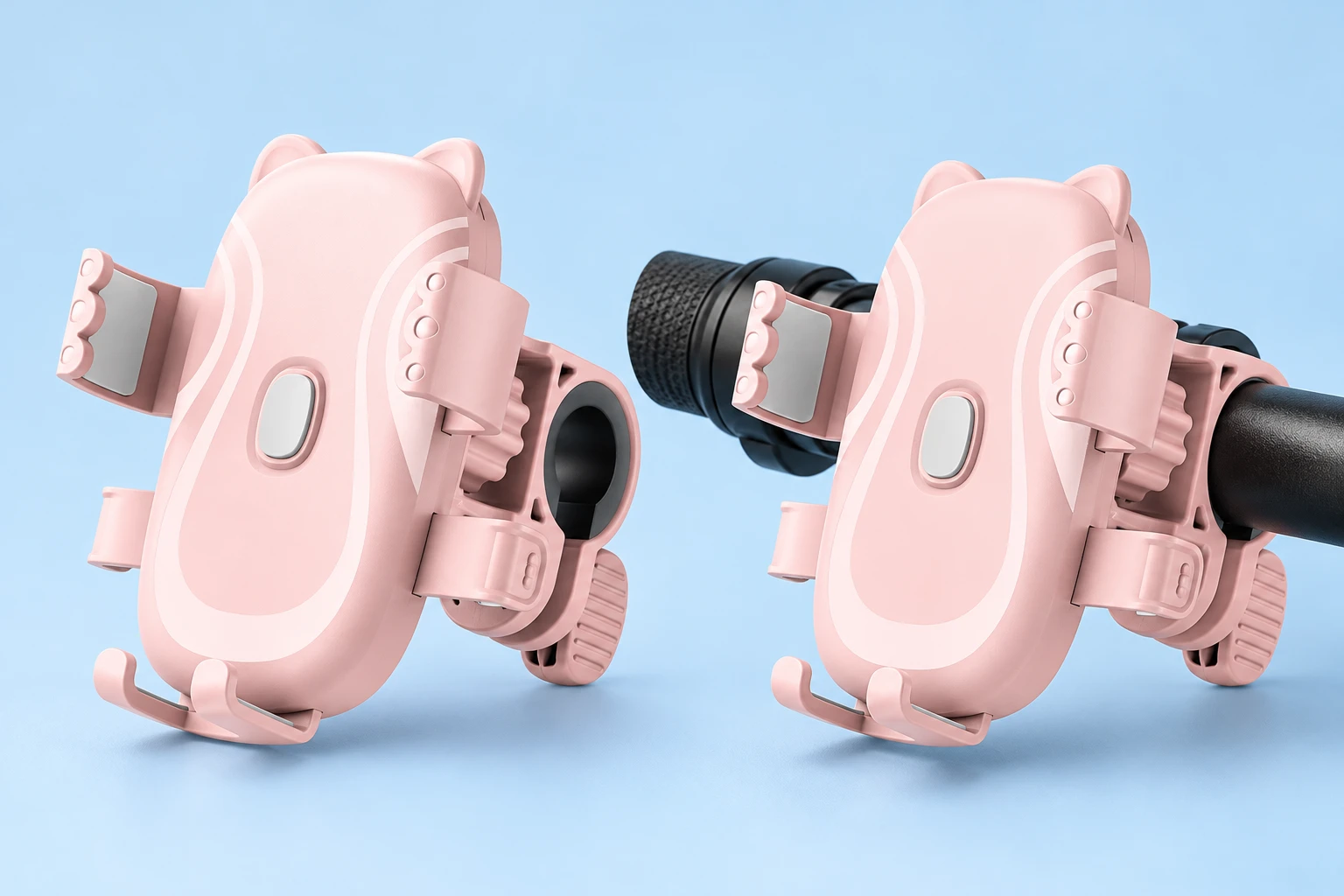 Pastel pink cat-ear phone cradle with handlebar clamp, shown empty on a stationary handlebar