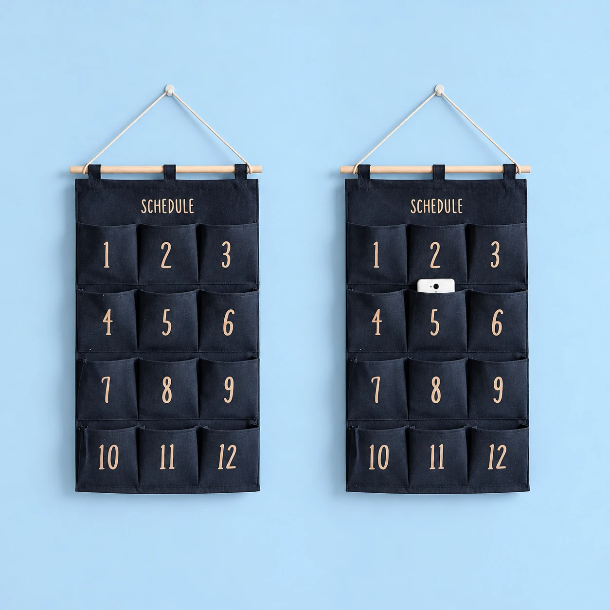 Denim Twelve-Pocket Cord-Hanging Phone Panel; product and illustrative use on pale blue. Phone and scene props excluded., square composition