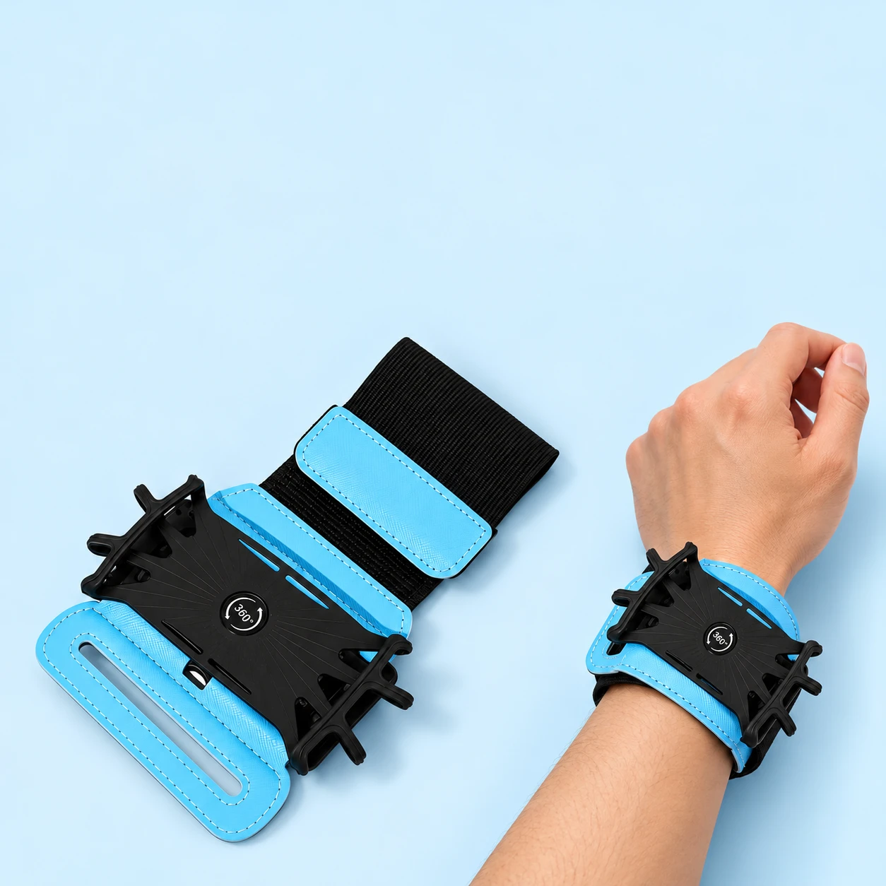 Sky blue wrist phone holder with flexible black corner cradle, shown complete and worn empty on a stationary wrist, square composition