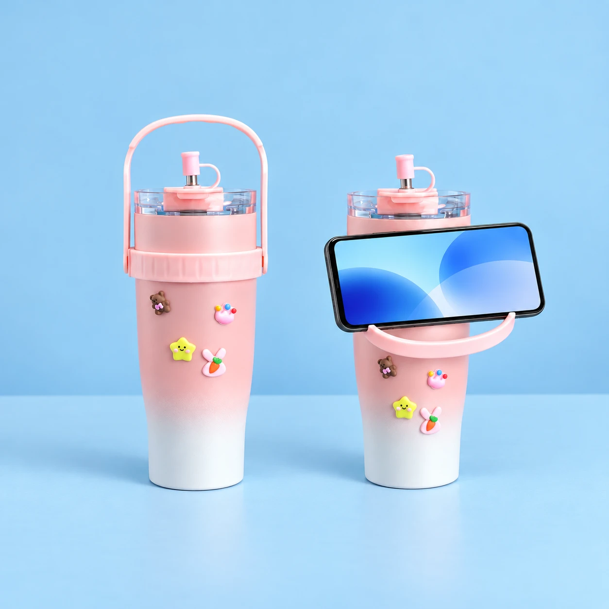 Pink Gradient Cup with Folding Phone-Rest Handle; product and illustrative use on pale blue. Phone and scene props excluded., square composition