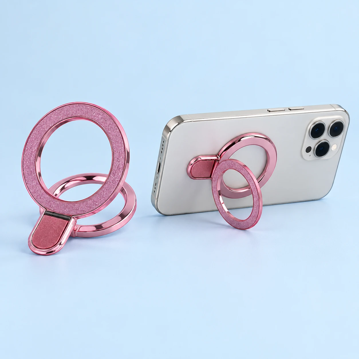 Pink glitter annular phone ring with lower tab, product and landscape stand use