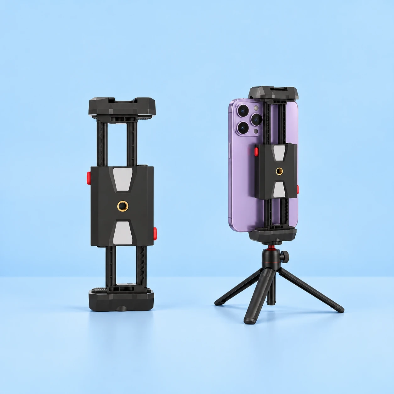 Complete black two-stage double-pull phone clamp at left, and the same clamp retaining a portrait phone on a demonstration mini tripod at right, against pale blue. Phone and tripod are not included., square composition