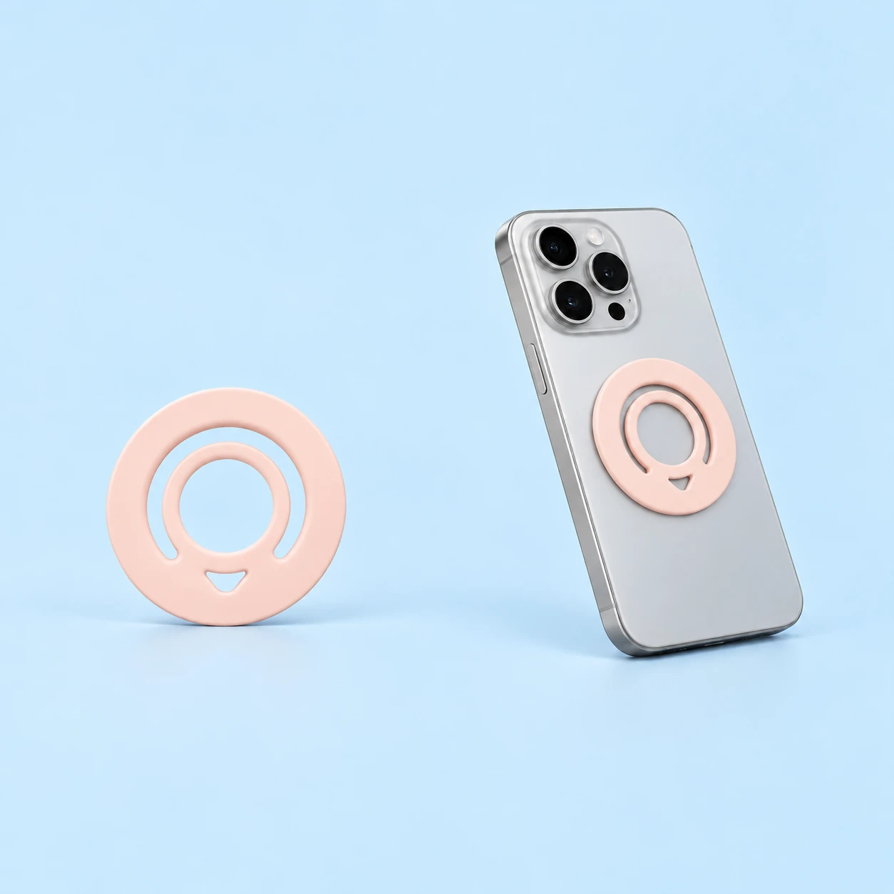 Pastel pink C-cut silicone magnetic finger-ring holder, isolated and closed on a phone case, square composition