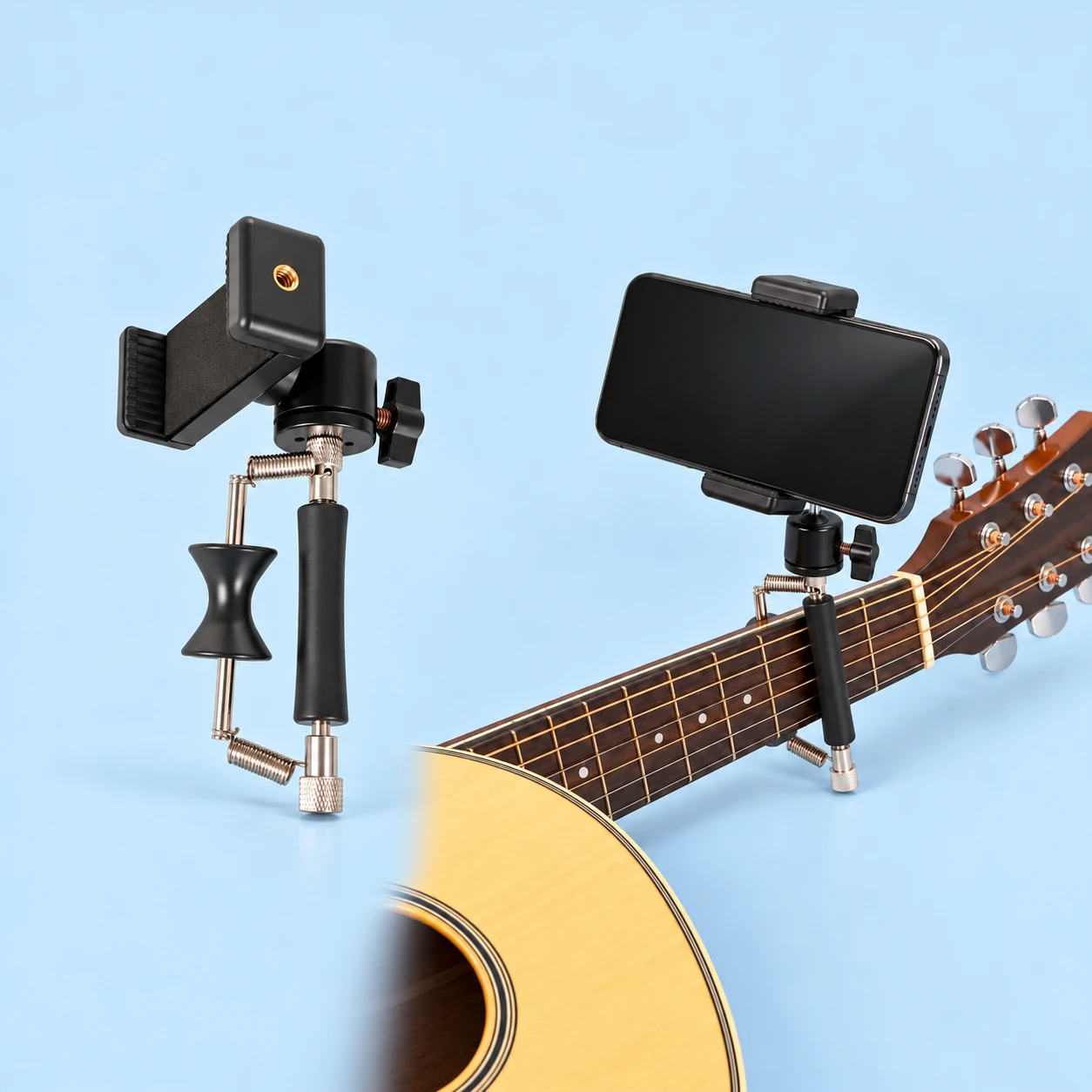 Complete black twin-spring D-frame capo phone holder at left and the same assembly holding a landscape phone on a stationary compatible guitar neck at right, against pale blue; guitar and phone excluded., square composition