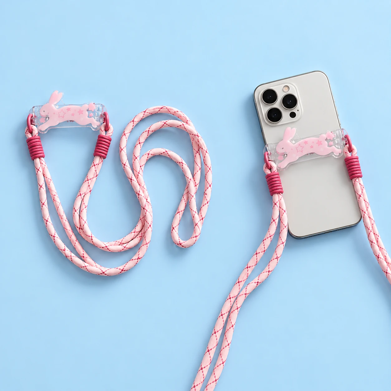 Pink leaping-rabbit decorated clear phone clamp with matching patterned long cord, square composition