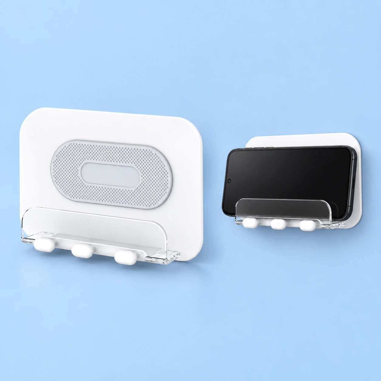 White Wall Phone Cradle with Clear Tray and Three Pegs; product and illustrative use on pale blue. Phone and scene props excluded., square composition