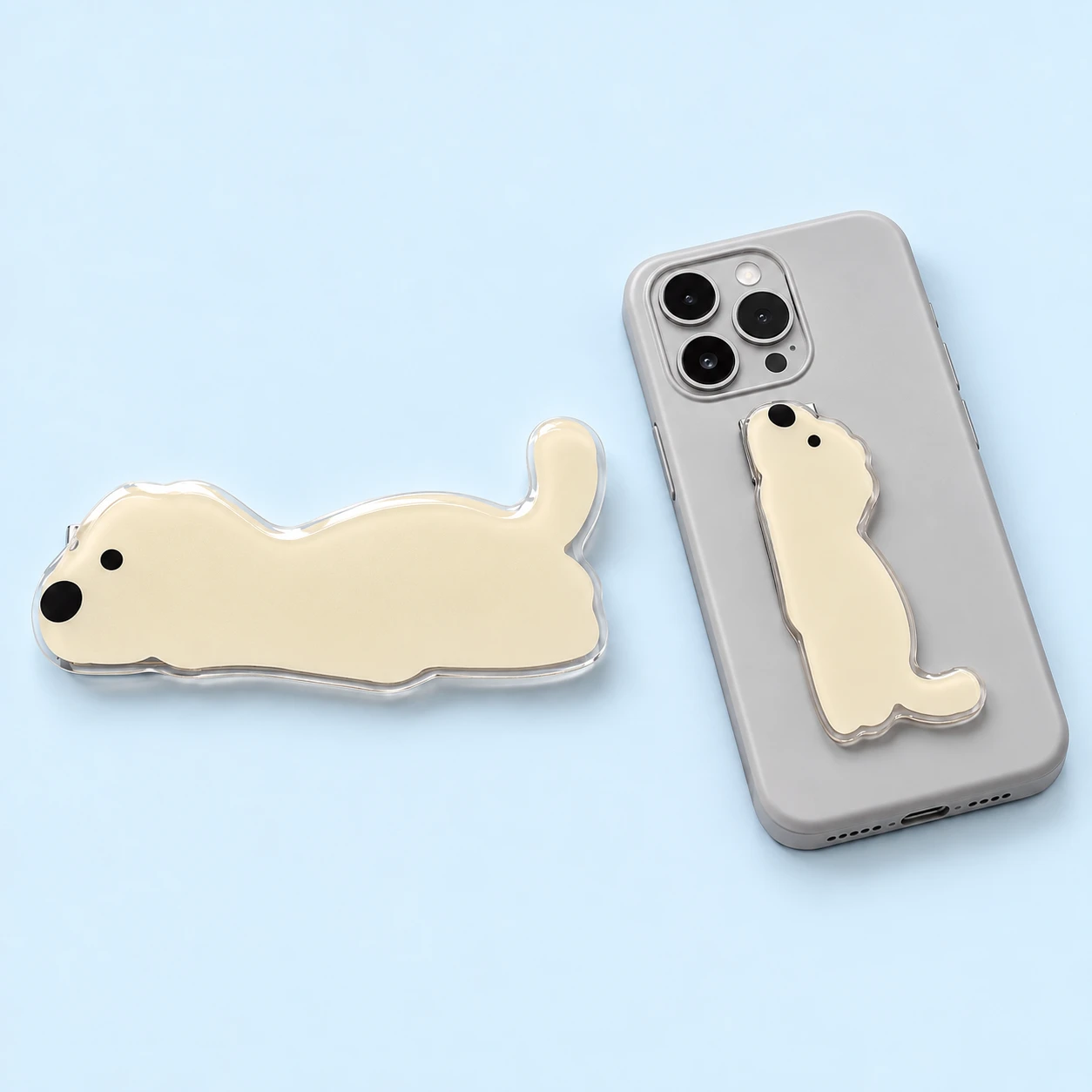 Cream reclining puppy folding phone kickstand and closed phone-back placement, square composition