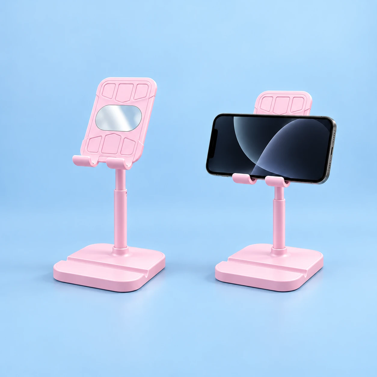 Pastel pink telescopic mirror-panel phone stand shown complete and supporting a landscape phone, square composition