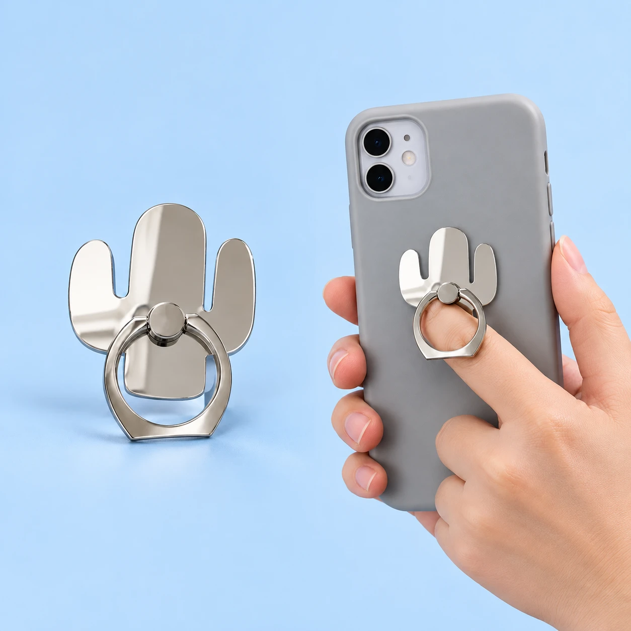 Mirrored cactus-shaped hinged phone ring holder with intended finger-loop illustration, square composition