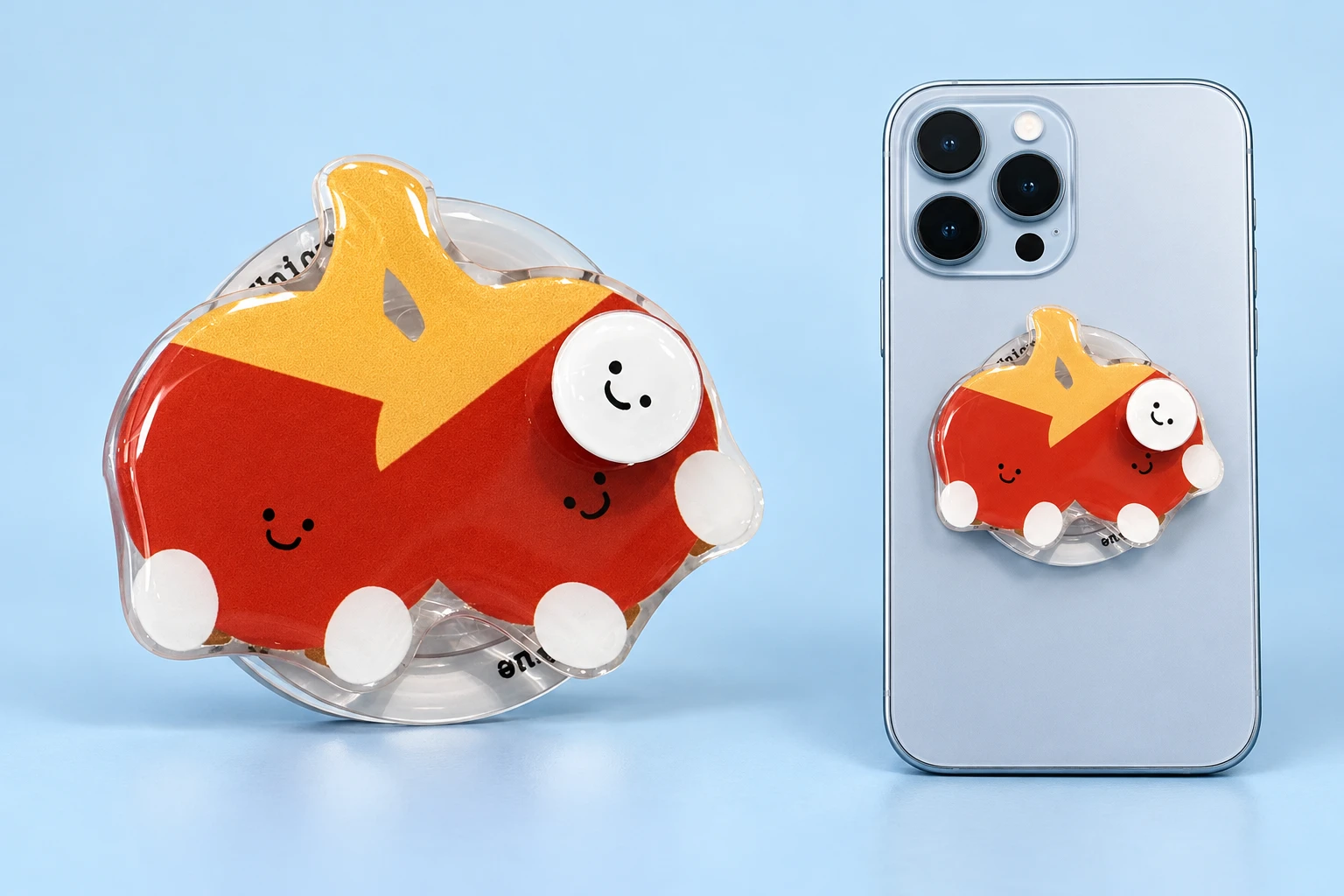 Twin smiling red table-tennis paddle phone grip, shown complete and flat-mounted on a phone