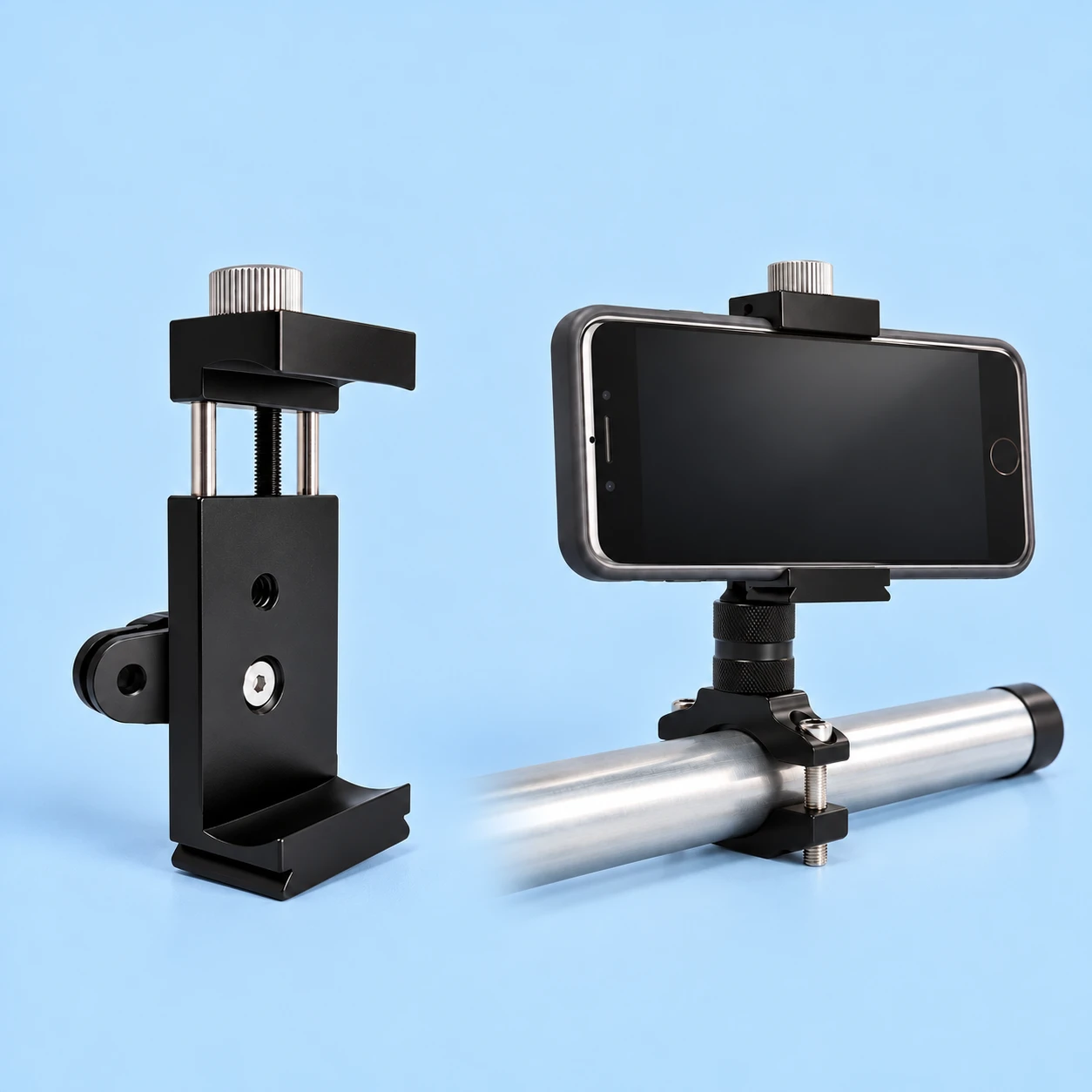 One complete black screw-lock phone adapter with its original rear two-prong clevis at left; the same clamp holding a landscape phone on a separate stationary pole-clamp mount at right, against pale blue. Phone, mating mount, host screw, pole clamp and tube are not included., square composition