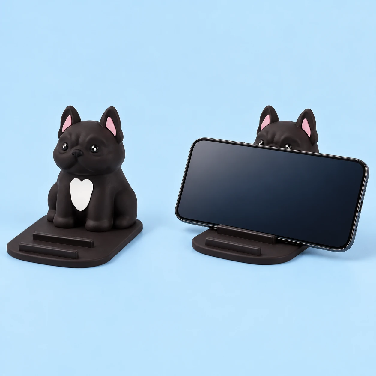 Black French bulldog phone stand with two fixed base stops, shown alone and supporting a landscape phone, square composition