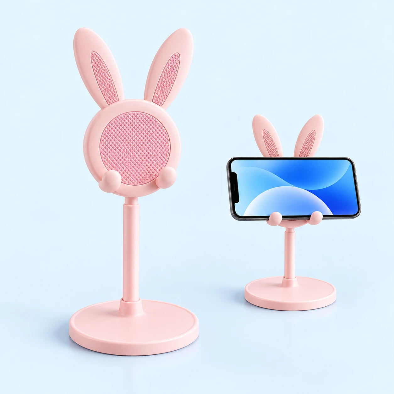 Pink bunny-ear telescoping phone stand, product on left and landscape phone use on right