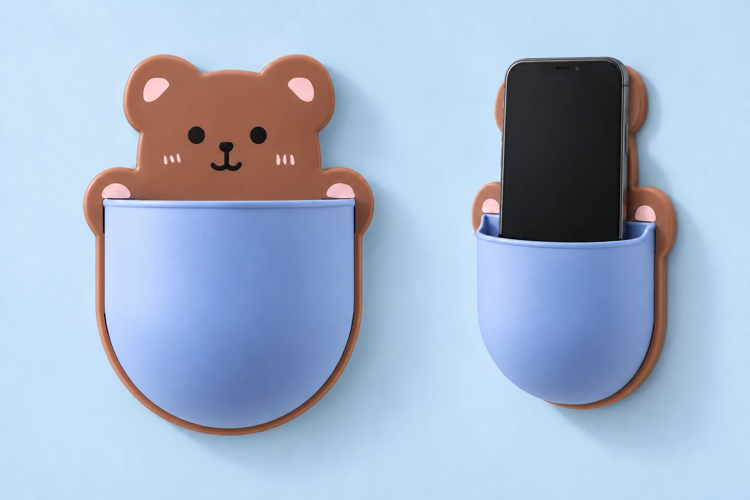 Brown bear-shaped wall phone pocket with blue curved front shown empty and holding an illustrative phone