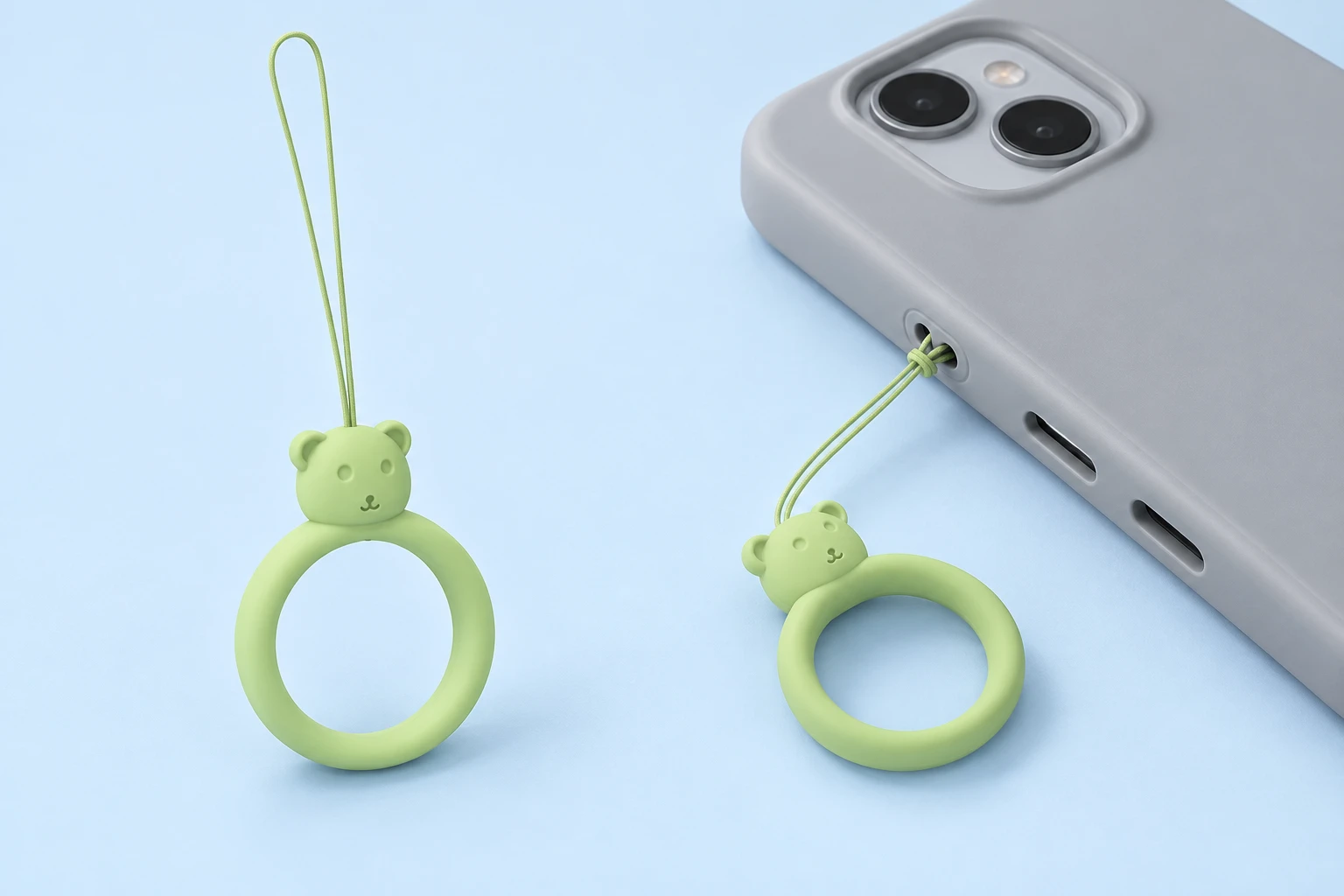 Matcha green bear-head finger-loop phone lanyard and direct case-eyelet attachment