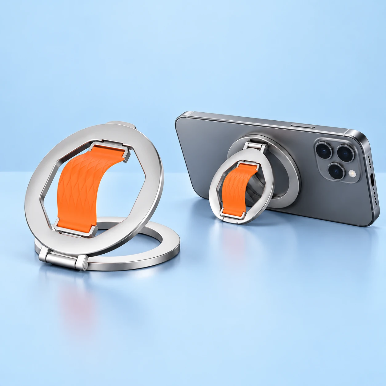 Silver and Orange LJ-S29 Hinged-Ring Finger Strap; product and illustrative use on pale blue. Phone and scene props excluded., square composition