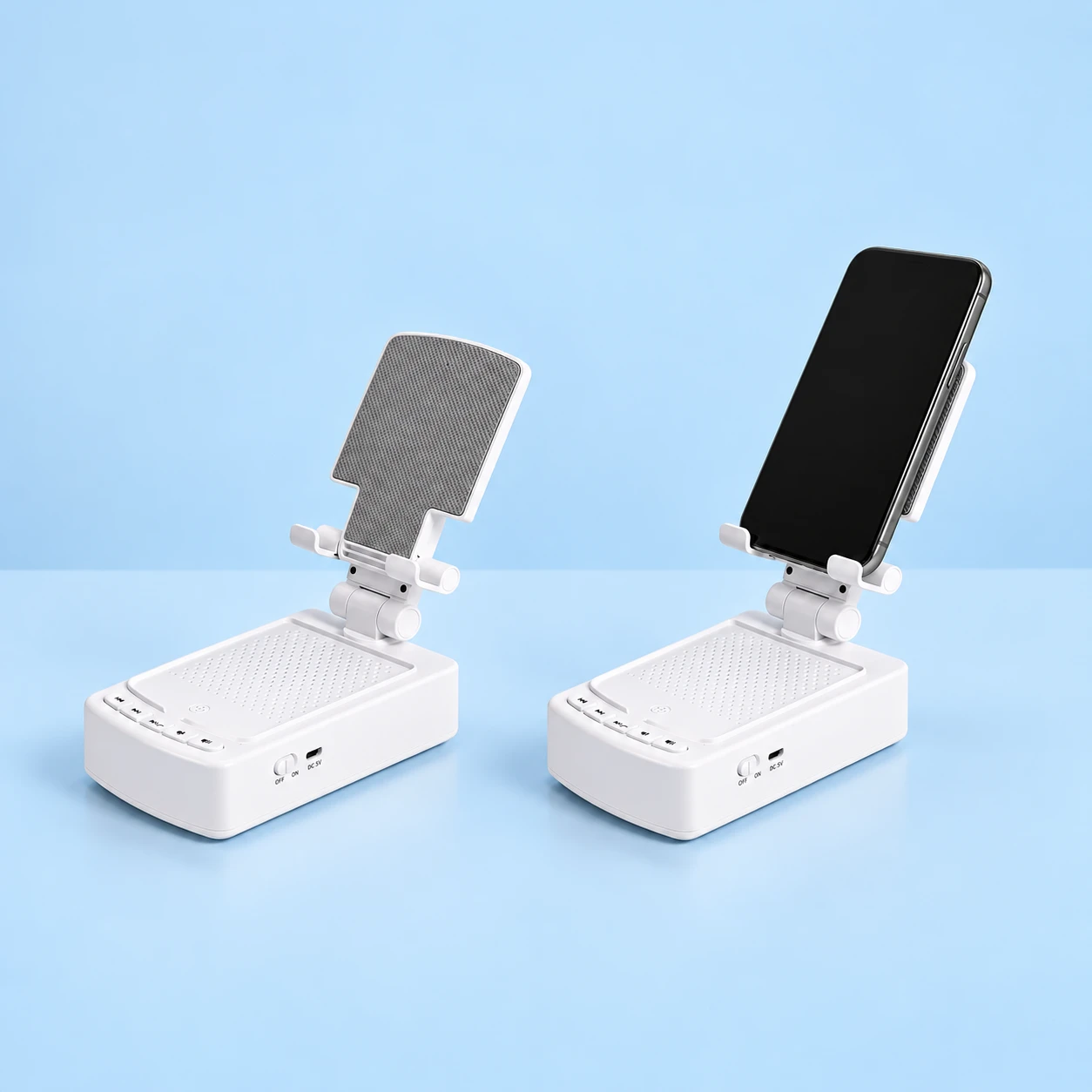 Complete white F28 height-adjustable phone stand with speaker and power-bank base on the left, with the same original stand supporting an inactive portrait phone on the right on pale blue. Phone is not included., square composition