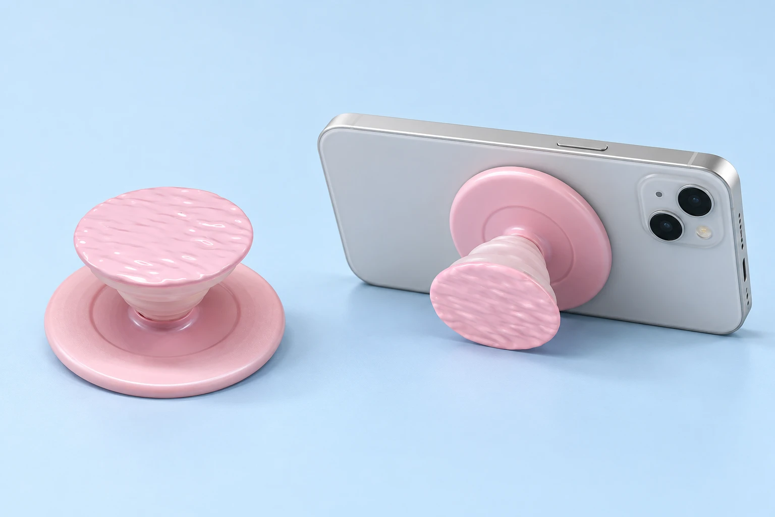 Pastel pink ripple-face magnetic expandable phone grip with illustrated landscape support
