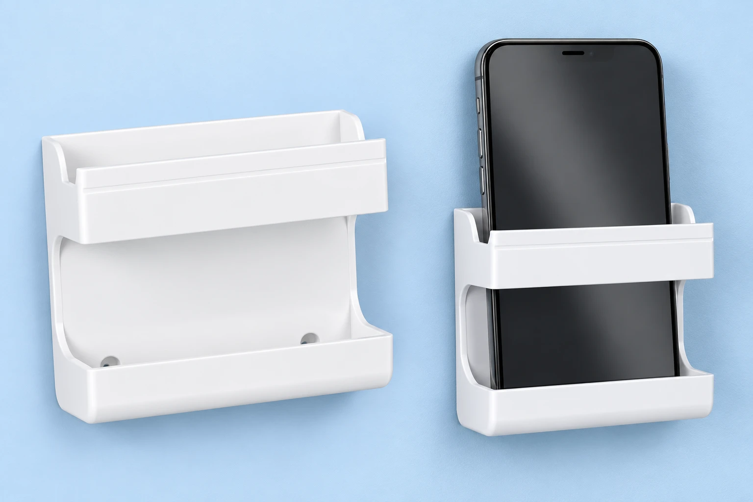Complete empty white YK31 fence-frame wall phone holder on the left and the same original solid-back holder retaining a portrait phone behind its upper band and in its lower trough on a pale-blue wall on the right; phone is an illustration prop.