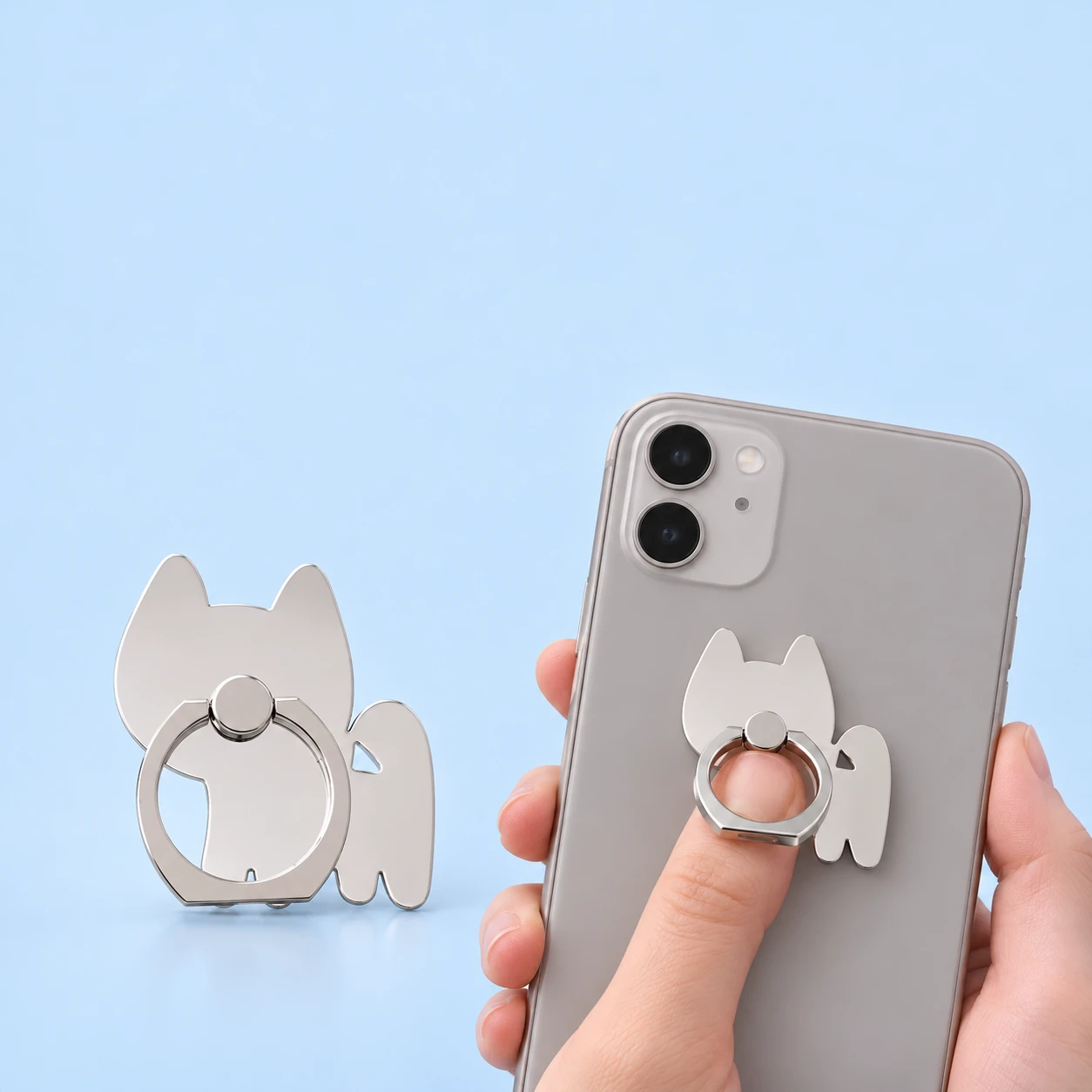 Mirrored curled-tail cat phone ring holder and illustrative finger-loop use, square composition