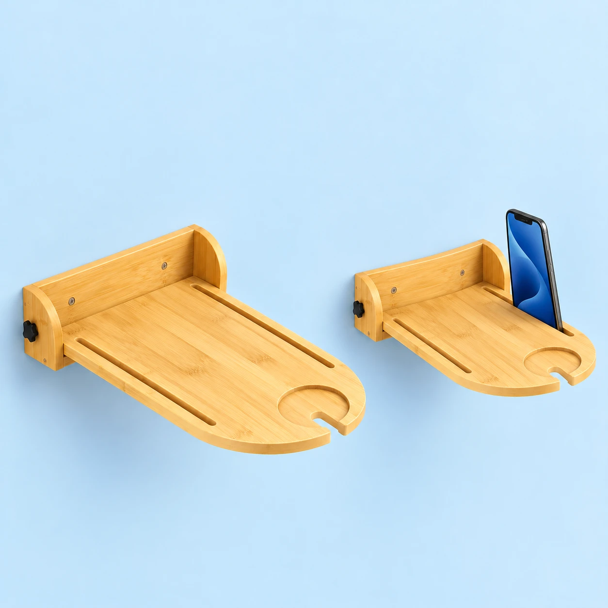 Natural wood-toned folding wall phone tray shown complete on the left and mounted on a dry wall with an illustrative phone seated in its original side groove on the right