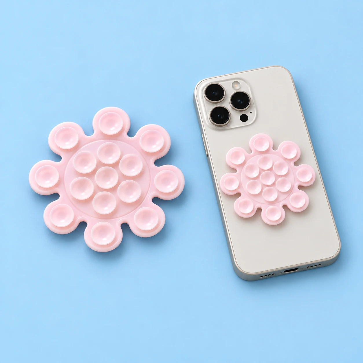 Pale pink eight-lobed sun suction phone pad with fifteen cups, square composition