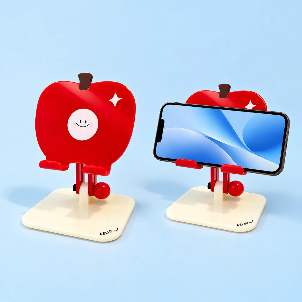 Opaque red smiling apple acrylic phone stand on a cream base, with landscape phone illustration, square composition