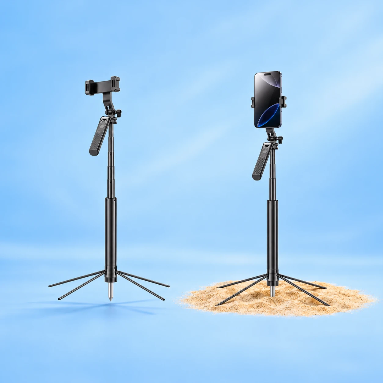 Complete black S29 four-foot selfie stand and ground spike at left, with the same no-light assembly holding a portrait demonstration phone on dry sand at right, on pale blue; phone not included., square composition