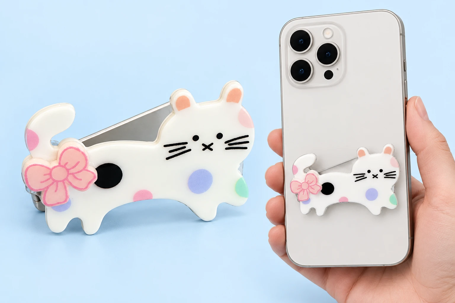 Tail-bow cat folding phone kickstand shown complete and mounted on a phone