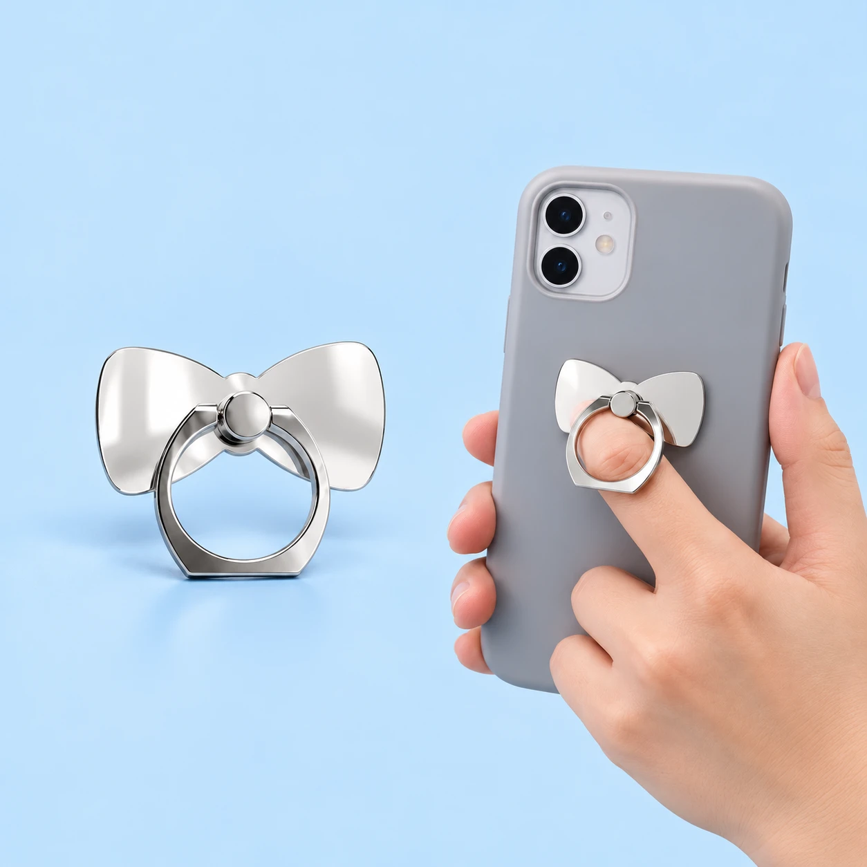 Mirrored bow phone ring holder and illustrative finger-loop use, square composition