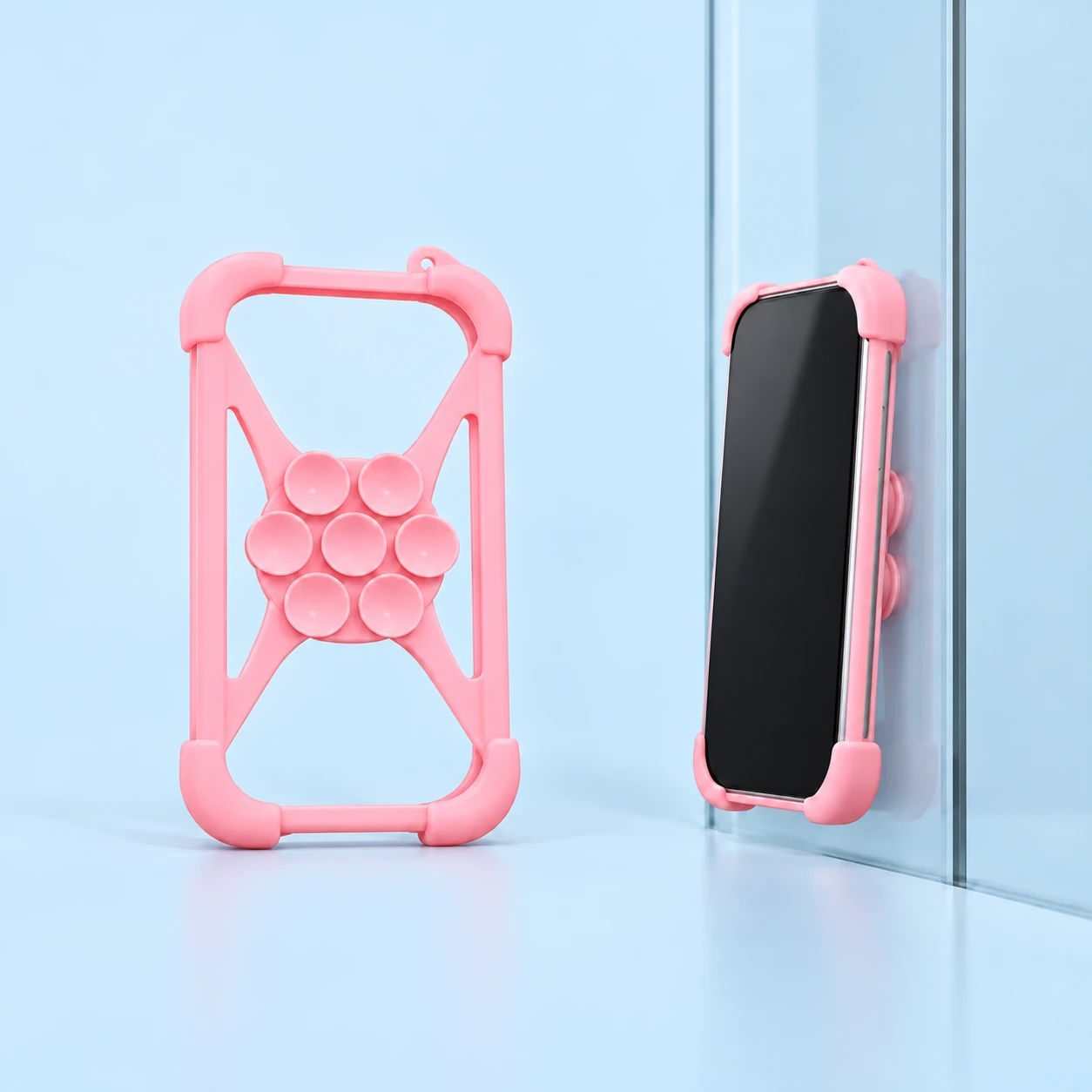 Pink Seven-Cup Suction Phone Sleeve; product and illustrative use on pale blue. Phone and scene props excluded., square composition