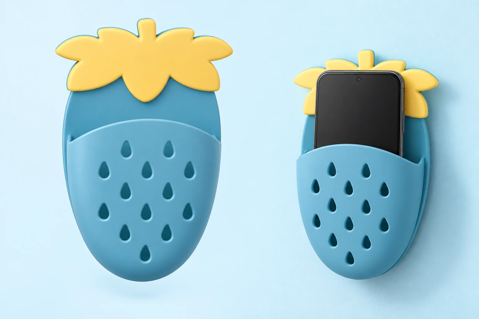 Blue strawberry-shaped wall phone pocket with yellow leaf crown, isolated and holding a portrait phone on a wall