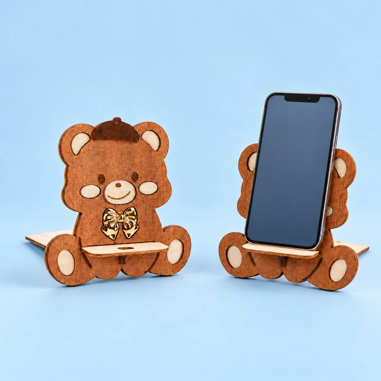 Layered wooden beret bear stand with gold-tone bow and projecting phone shelf, square composition