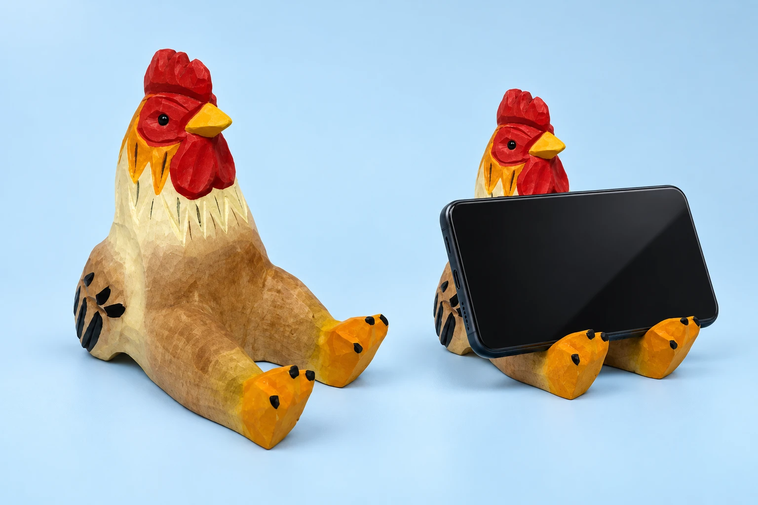 Carved wooden rooster phone stand shown complete and supporting a landscape phone