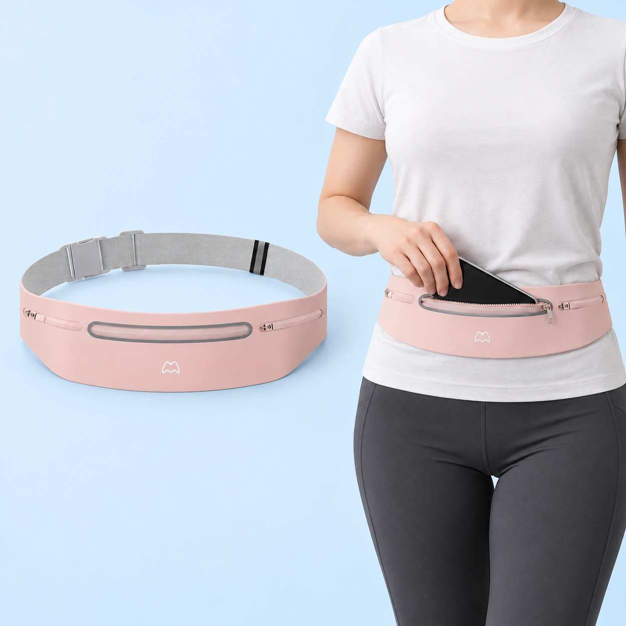 Blush pink three-pocket phone belt shown complete and worn with phone insertion through the center zipper, square composition