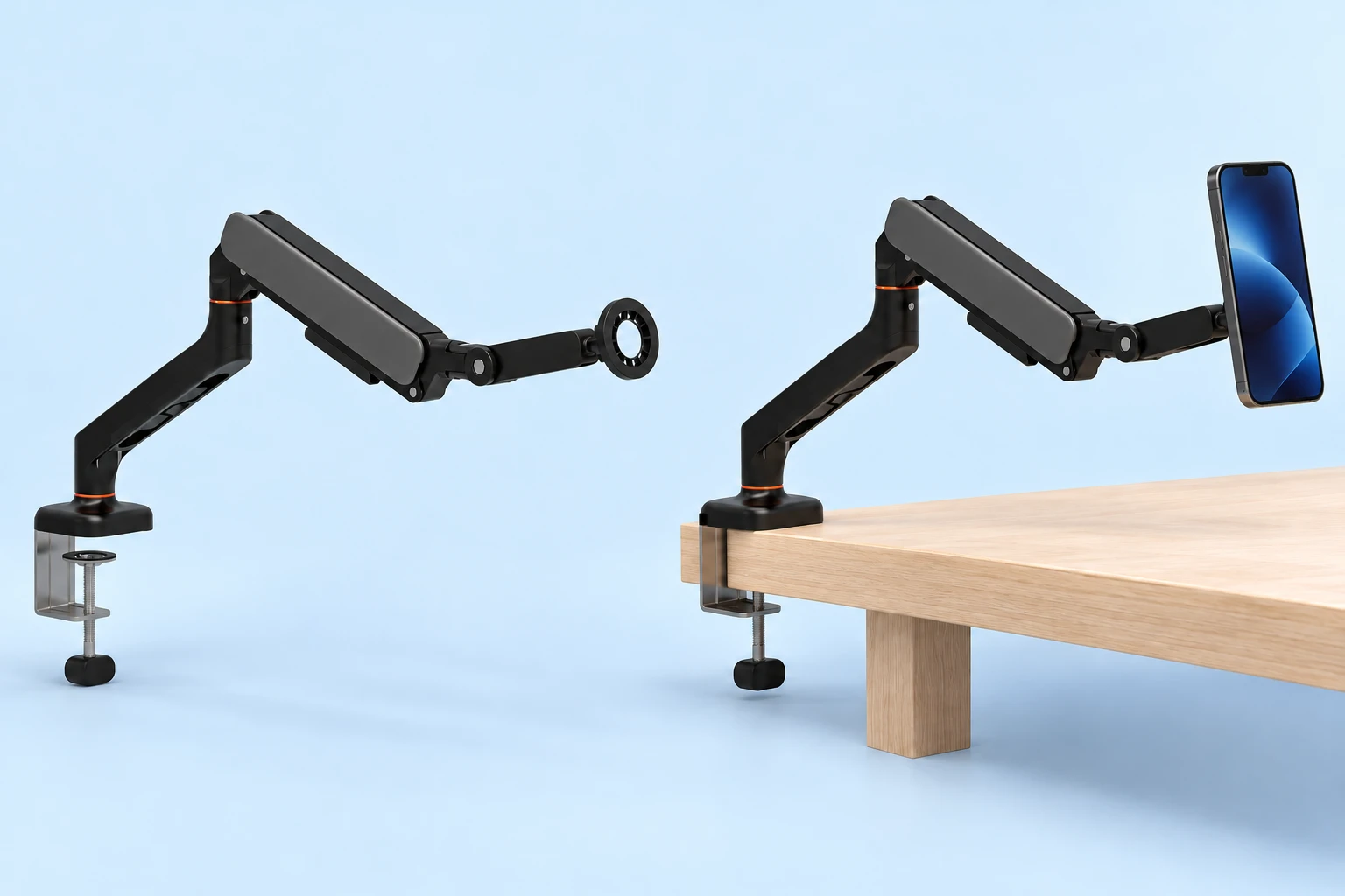 Complete black enclosed-arm magnetic phone holder with original silver screw desk clamp and empty open annular head at left; the same complete holder mounted to a wooden desk edge with an illustrative compatible portrait phone at right, on pale blue. Phone and desk not included.