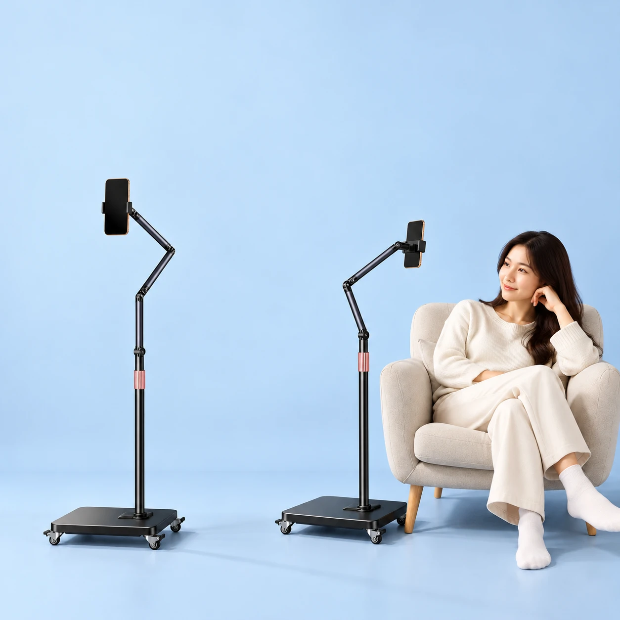 Black Rectangular-Platform Rolling Phone Floor Stand; product and illustrative use on pale blue. Phone and scene props excluded., square composition