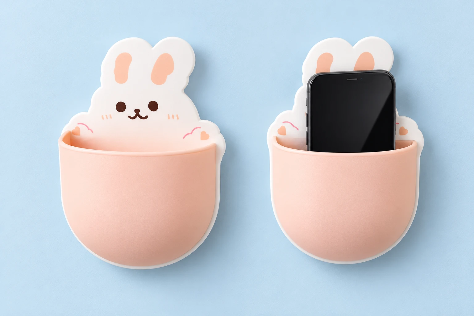White rabbit-shaped wall phone pocket with peach pink curved front shown empty and holding an illustrative phone