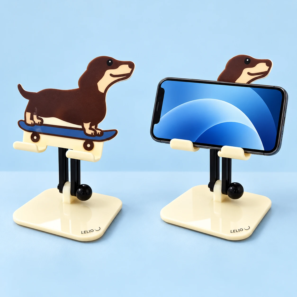 Skateboard Dachshund Folding Phone Stand with blue skateboard, complete stand left and landscape phone use right on pale blue; phone not included