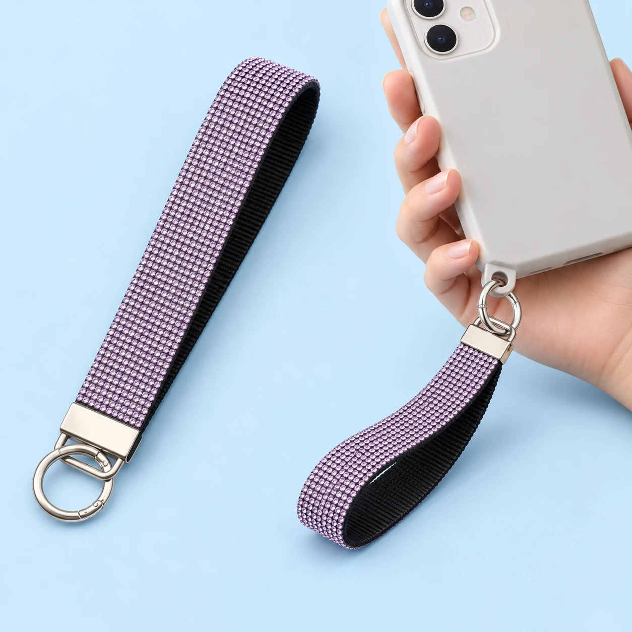 Lilac jewel-effect flat phone wrist loop with round gate, product and supported compatible-case use