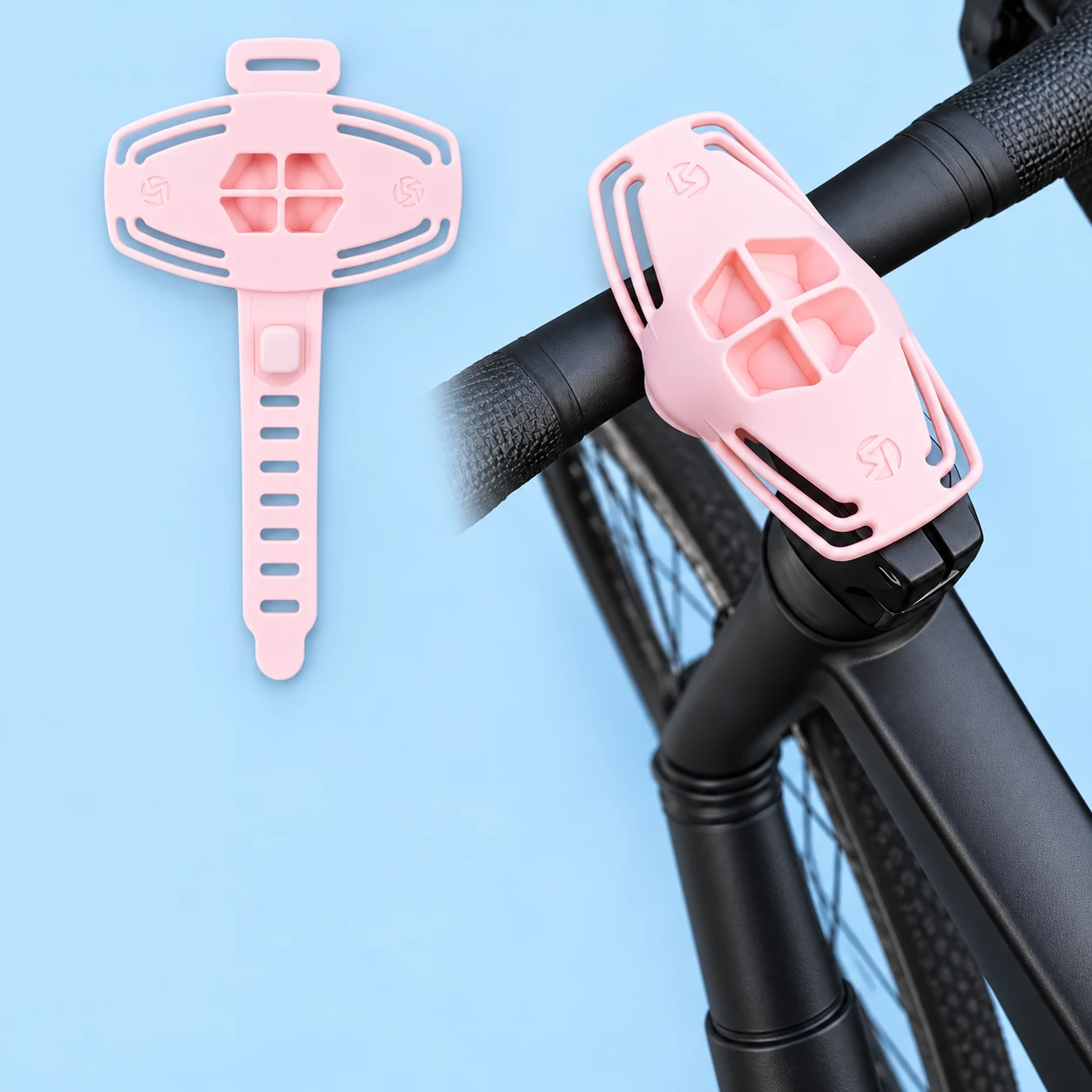 Pastel pink slotted silicone phone holder with integral strap shown complete and mounted empty on a stationary bicycle handlebar, square composition