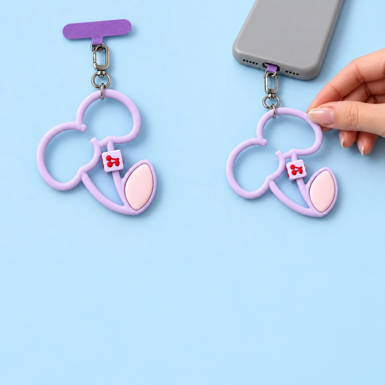 Lilac double-cherry silicone phone lanyard complete with case tab and clasp, plus attached phone illustration, square composition