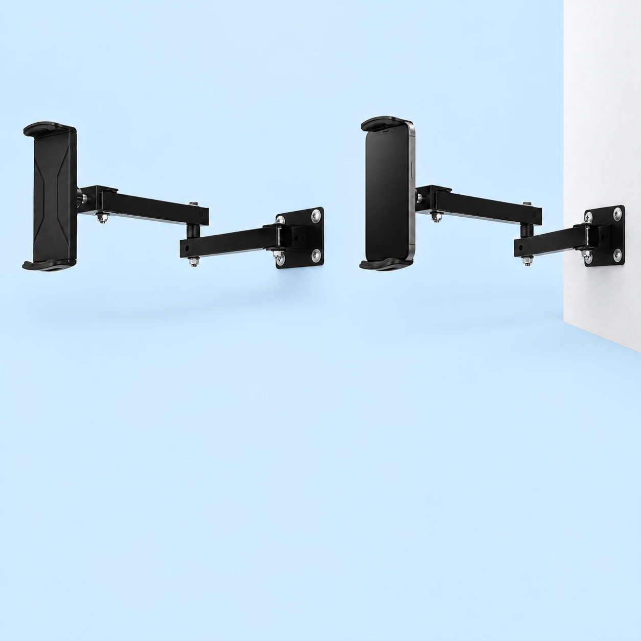 Two views of a black two-link swing-out wall phone holder on pale blue: complete empty bracket at left and the same bracket holding a portrait phone on a vertical wall at right., square composition