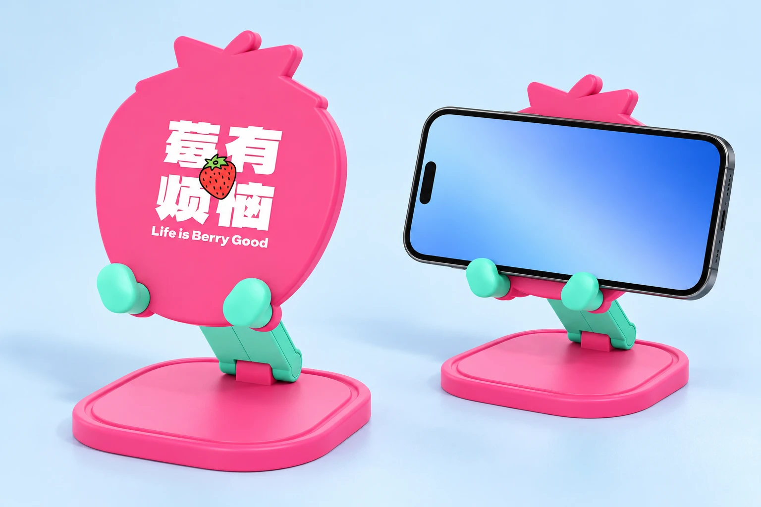 Pink strawberry folding phone stand, complete stand left and landscape phone in mint cradle lips right; phone not included