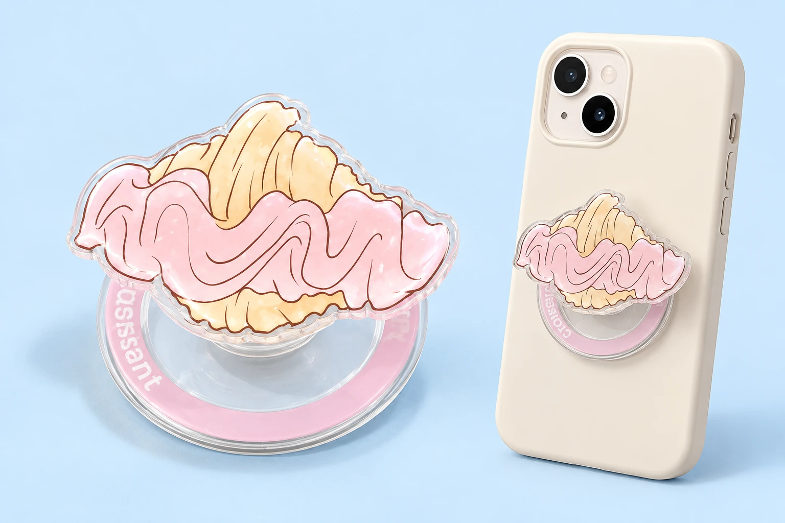 Pink frosted croissant magnetic phone grip shown complete and flat-mounted on a phone