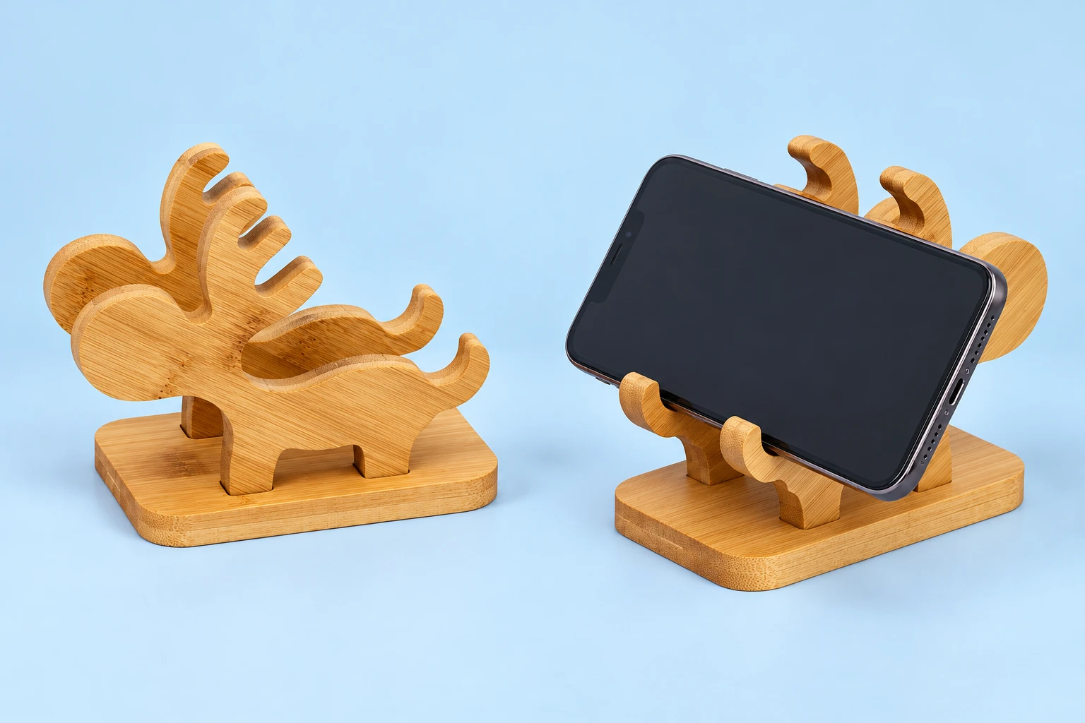 Natural bamboo stand with two parallel deer-antler boards shown complete and supporting an illustrative landscape phone