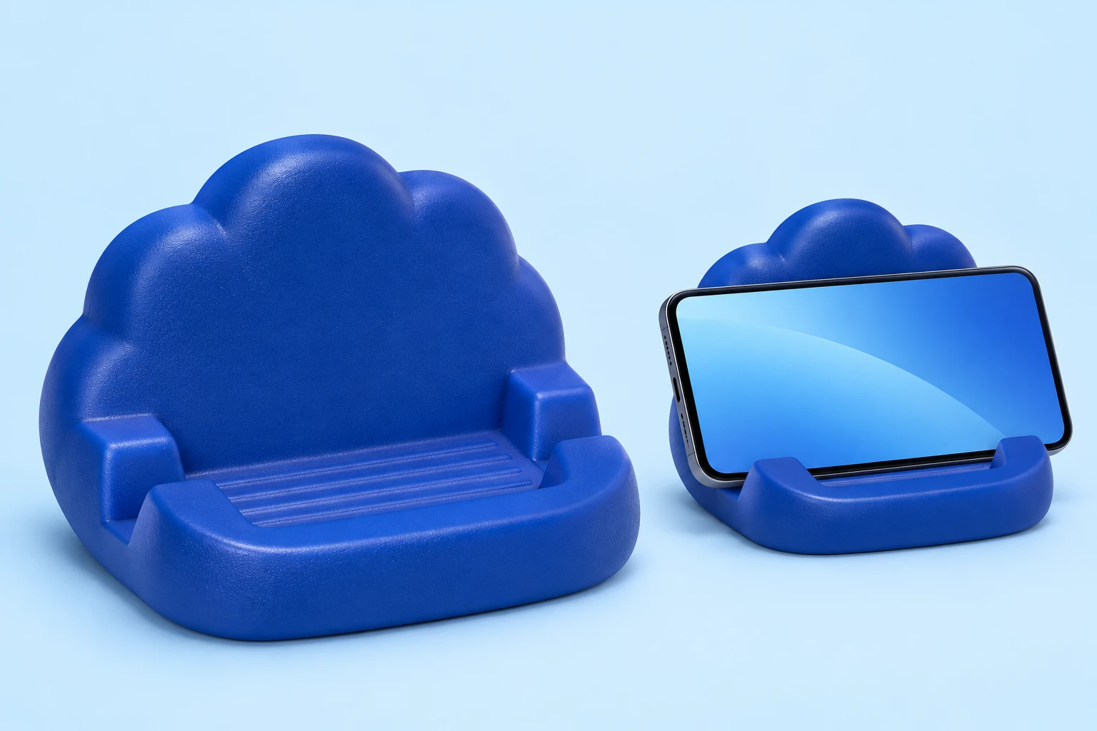 Blue one-piece PU foam cloud phone cradle, with an illustrative landscape-phone resting view; phone not included