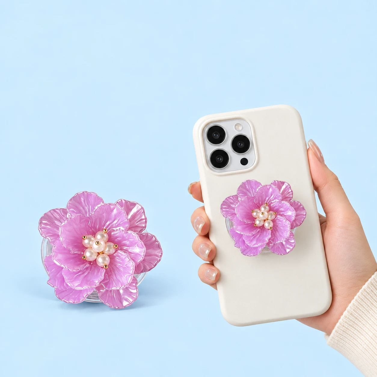 Lilac ruffled flower phone grip with pearl-effect center, shown alone and closed on a phone case, square composition